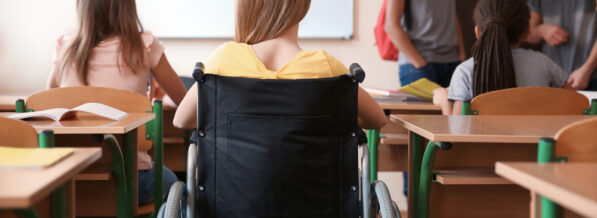 Teenage,Girl,In,Wheelchair,With,Classmates,At,School